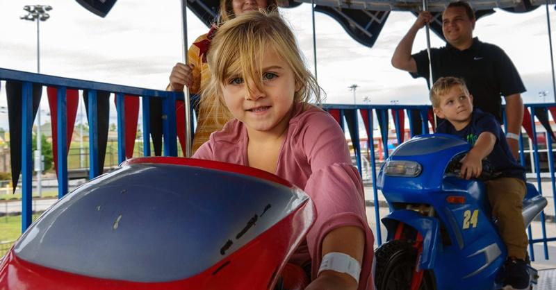 girl on carousel