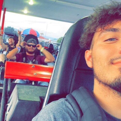 Teenagers taking a selfie on go karts